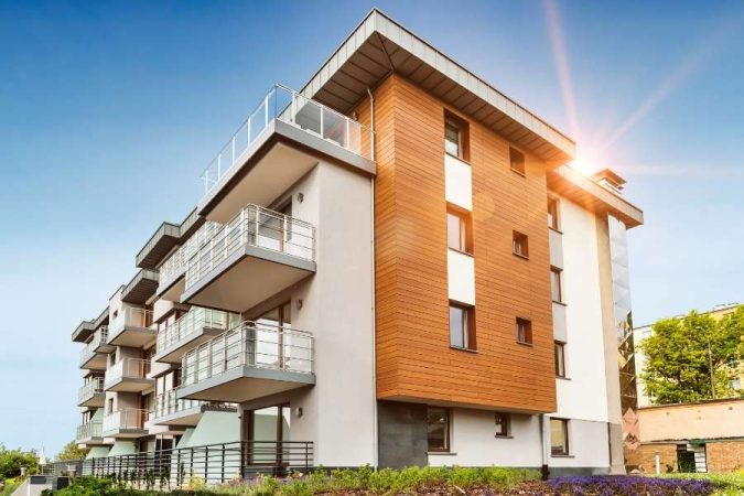 Immeuble moderne à l'architecture contemporaine avec des façades en bois pour acheter dans le neuf à Port-Marianne.